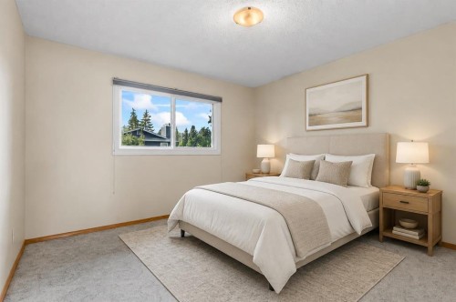 92 Canova Road Sw, Calgary, AB - Indoor Photo Showing Bedroom