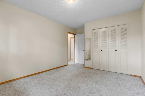 92 Canova Road Sw, Calgary, AB - Indoor Photo Showing Other Room