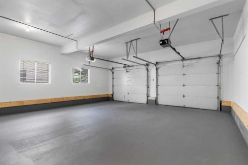 92 Canova Road Sw, Calgary, AB - Indoor Photo Showing Garage