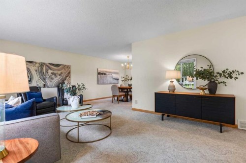 92 Canova Road Sw, Calgary, AB - Indoor Photo Showing Living Room