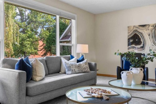 92 Canova Road Sw, Calgary, AB - Indoor Photo Showing Living Room