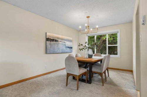 92 Canova Road Sw, Calgary, AB - Indoor Photo Showing Dining Room