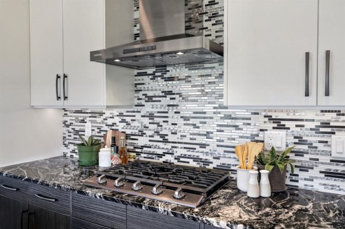 32 Legacy Cove Se, Calgary, AB - Indoor Photo Showing Kitchen With Upgraded Kitchen