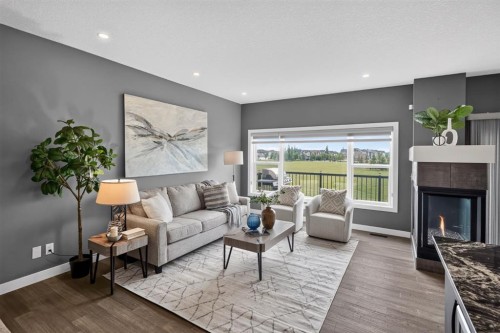 32 Legacy Cove Se, Calgary, AB - Indoor Photo Showing Living Room With Fireplace