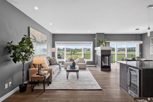 32 Legacy Cove Se, Calgary, AB - Indoor Photo Showing Living Room