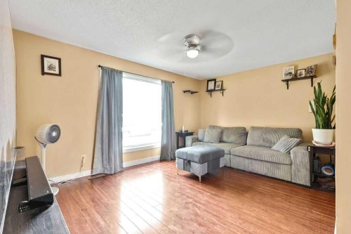 44 Falwood Crescent Ne, Calgary, AB - Indoor Photo Showing Living Room