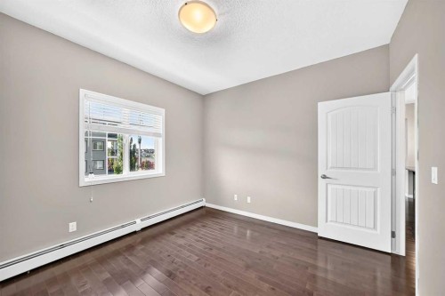 2401-175 Panatella Hill Nw, Calgary, AB - Indoor Photo Showing Other Room