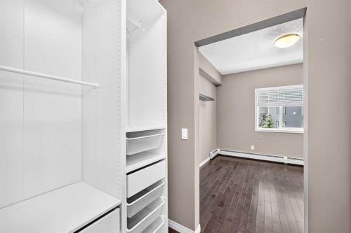 2401-175 Panatella Hill Nw, Calgary, AB - Indoor Photo Showing Other Room