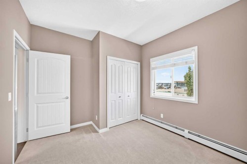 2401-175 Panatella Hill Nw, Calgary, AB - Indoor Photo Showing Other Room