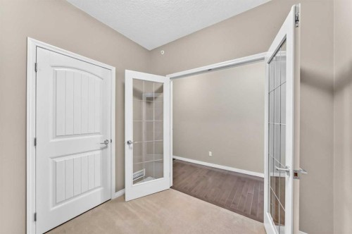 2401-175 Panatella Hill Nw, Calgary, AB - Indoor Photo Showing Other Room