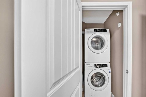 2401-175 Panatella Hill Nw, Calgary, AB - Indoor Photo Showing Laundry Room