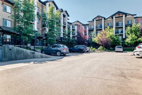 2401-175 Panatella Hill Nw, Calgary, AB - Outdoor With Facade