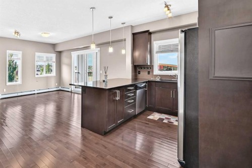 2401-175 Panatella Hill Nw, Calgary, AB - Indoor Photo Showing Kitchen
