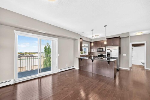 2401-175 Panatella Hill Nw, Calgary, AB - Indoor Photo Showing Kitchen