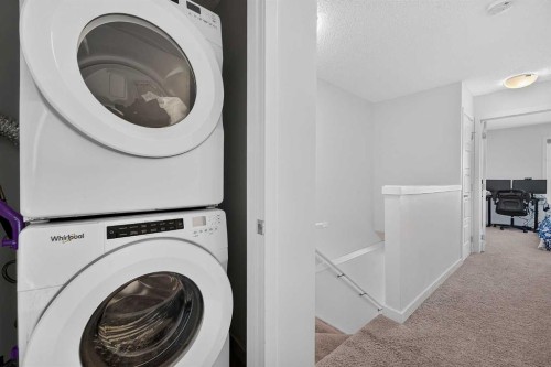 433-301 Redstone Boulevard Ne, Calgary, AB - Indoor Photo Showing Laundry Room