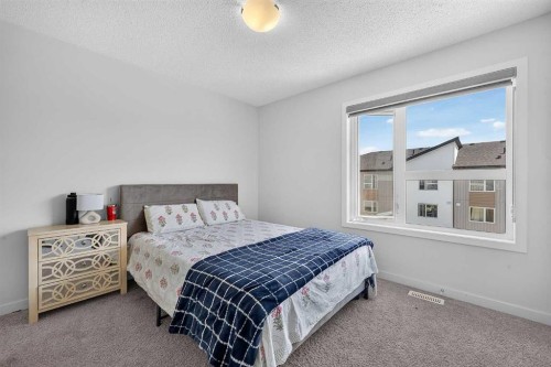 433-301 Redstone Boulevard Ne, Calgary, AB - Indoor Photo Showing Bedroom