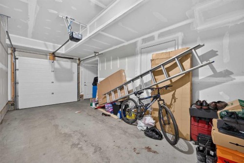 433-301 Redstone Boulevard Ne, Calgary, AB - Indoor Photo Showing Garage