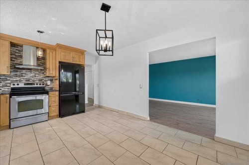 235 Abalone Place Ne, Calgary, AB - Indoor Photo Showing Kitchen
