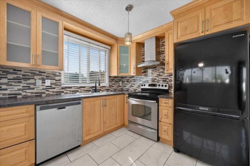 235 Abalone Place Ne, Calgary, AB - Indoor Photo Showing Kitchen