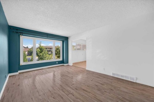 235 Abalone Place Ne, Calgary, AB - Indoor Photo Showing Other Room