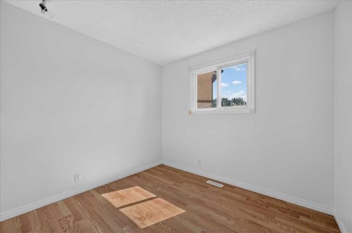 235 Abalone Place Ne, Calgary, AB - Indoor Photo Showing Other Room