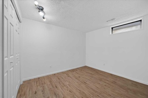 235 Abalone Place Ne, Calgary, AB - Indoor Photo Showing Other Room