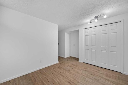 235 Abalone Place Ne, Calgary, AB - Indoor Photo Showing Other Room