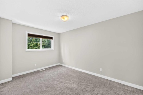86 Pantego Lane Nw, Calgary, AB - Indoor Photo Showing Other Room