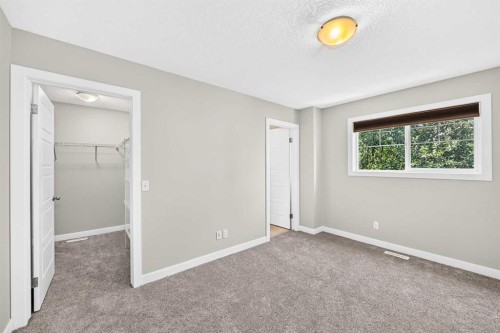 86 Pantego Lane Nw, Calgary, AB - Indoor Photo Showing Other Room