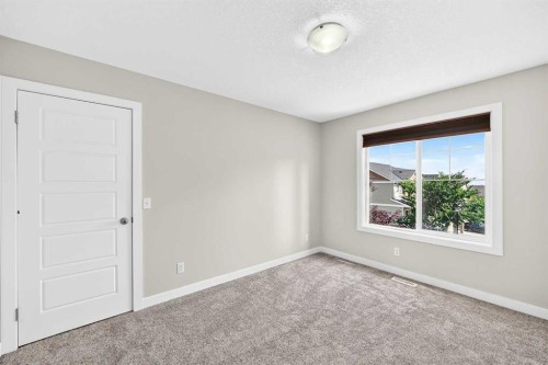 86 Pantego Lane Nw, Calgary, AB - Indoor Photo Showing Other Room