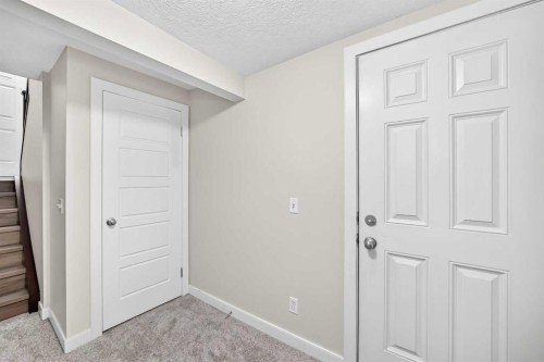 86 Pantego Lane Nw, Calgary, AB - Indoor Photo Showing Other Room