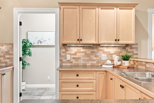 209-59 22 Avenue Sw, Calgary, AB - Indoor Photo Showing Kitchen With Double Sink