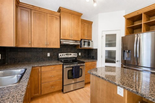 108 Tuscany Estates Close Nw, Calgary, AB - Indoor Photo Showing Kitchen With Double Sink