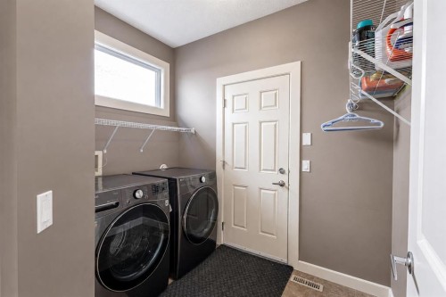 108 Tuscany Estates Close Nw, Calgary, AB - Indoor Photo Showing Laundry Room