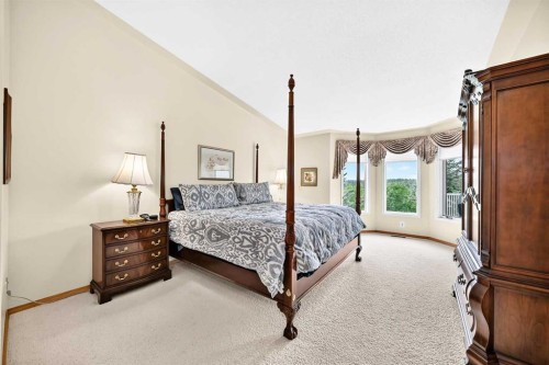 36 Sunset Way, Priddis Greens, AB - Indoor Photo Showing Bedroom