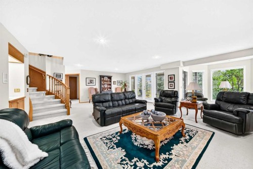 36 Sunset Way, Priddis Greens, AB - Indoor Photo Showing Living Room