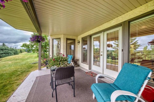 36 Sunset Way, Priddis Greens, AB - Outdoor With Deck Patio Veranda With Exterior
