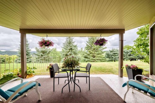 36 Sunset Way, Priddis Greens, AB - Outdoor With Deck Patio Veranda