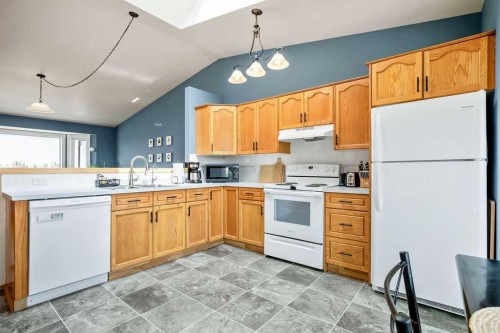 115 5 St, Dalroy, AB - Indoor Photo Showing Kitchen With Double Sink