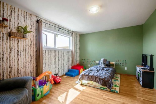 115 5 St, Dalroy, AB - Indoor Photo Showing Bedroom