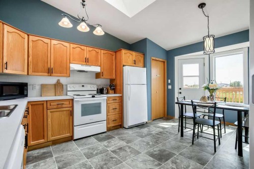 115 5 St, Dalroy, AB - Indoor Photo Showing Kitchen With Double Sink