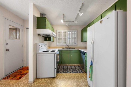 224 Berwick Way Nw, Calgary, AB - Indoor Photo Showing Kitchen With Double Sink