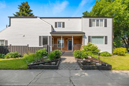 2801 7 Avenue Nw, Calgary, AB - Outdoor With Deck Patio Veranda With Facade