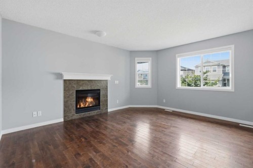 289 Taralake Terrace Ne, Calgary, AB - Indoor Photo Showing Living Room With Fireplace