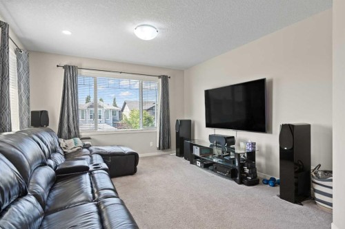 39 Brightoncrest Point Se, Calgary, AB - Indoor Photo Showing Living Room