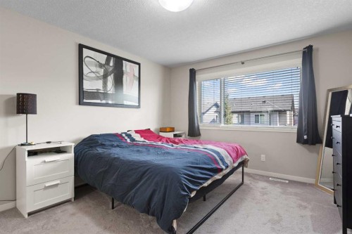 39 Brightoncrest Point Se, Calgary, AB - Indoor Photo Showing Bedroom