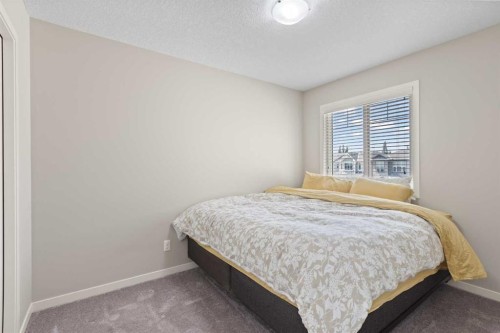 39 Brightoncrest Point Se, Calgary, AB - Indoor Photo Showing Bedroom