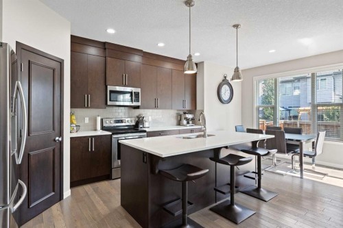 39 Brightoncrest Point Se, Calgary, AB - Indoor Photo Showing Kitchen With Upgraded Kitchen