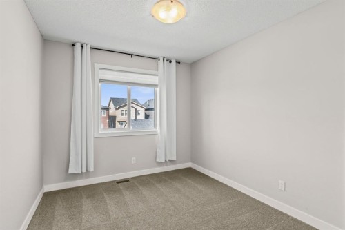 115 Wolf Willow Boulevard Se, Calgary, AB - Indoor Photo Showing Other Room