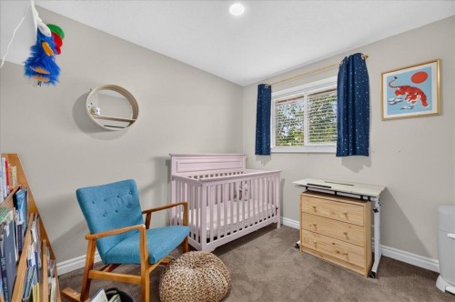 57 Beacham Way Nw, Calgary, AB - Indoor Photo Showing Bedroom